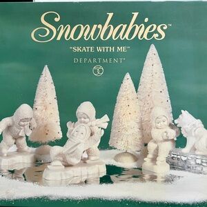 Department 56 Snowbabies figurine set, likely titled "Skate With Me" 56-69073.